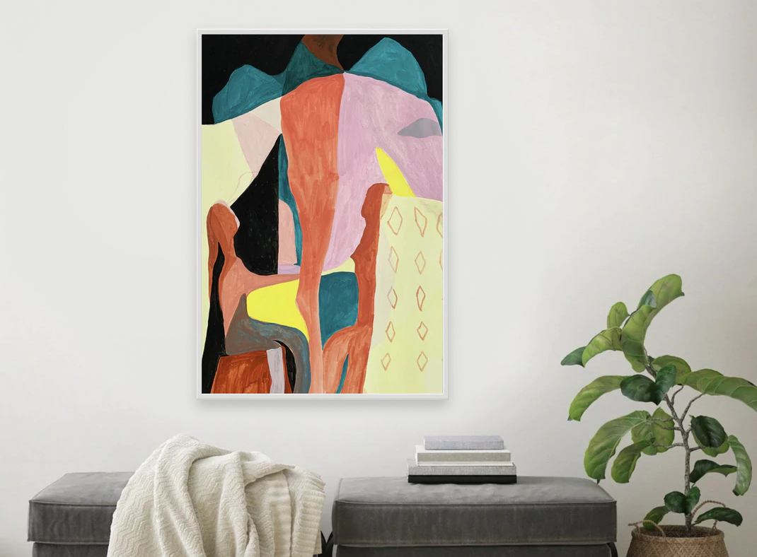 A room with a colorful painting hanging on the wall